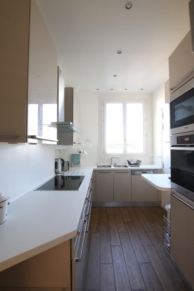furnished  3 bedrooms Apartment PARIS 16 - 116 m²;